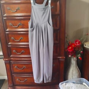 Stylish Gray Jumpsuit with Adjustable Button Straps